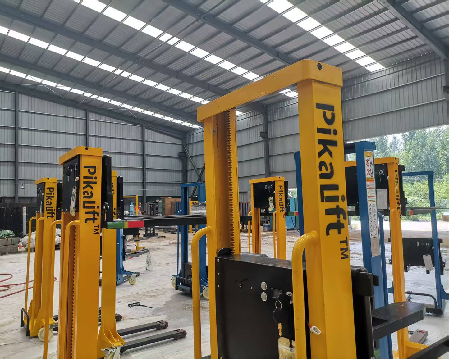 Yellow PikaLift forklifts in a warehouse setting